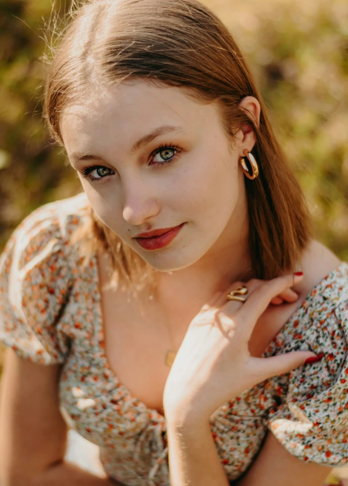 a woman in a dress posing for a picture